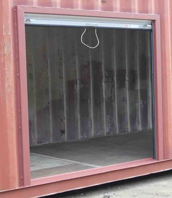 8′ Wide x 7′ 4″ Tall Roll Door In High Cube Container Side - Image 4